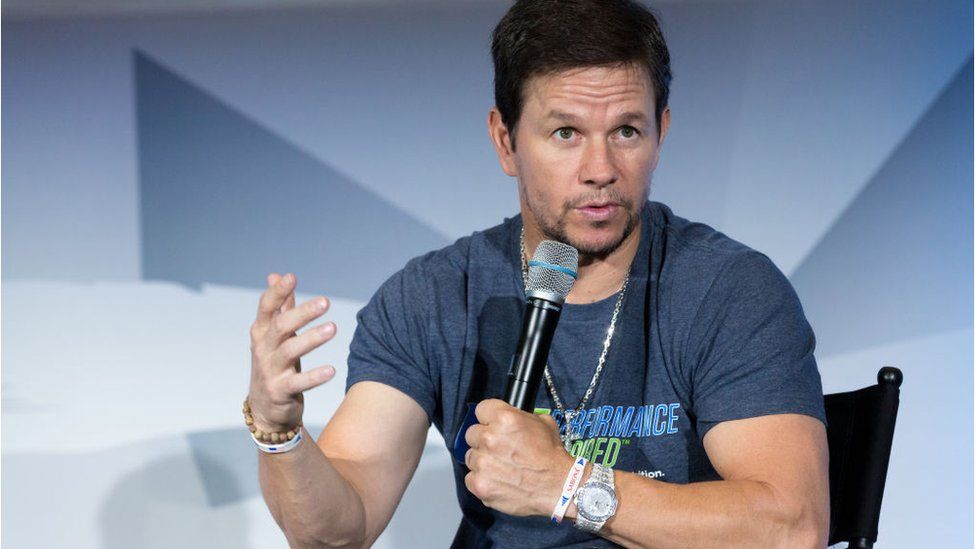 Mark Wahlberg speaking onstage