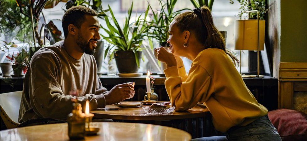 Couple on a weekend date at cafe